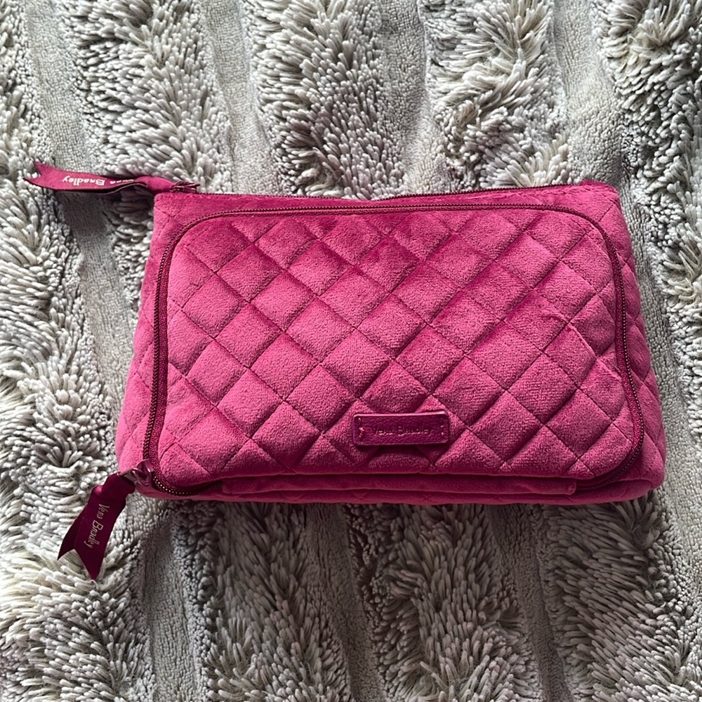 Vera Bradley cosmetic bag in magenta.